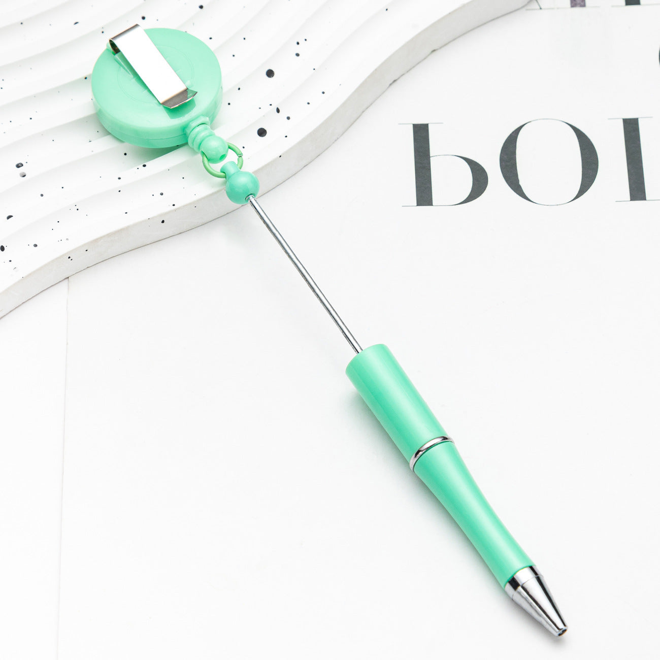 Easy-pull button bead pen