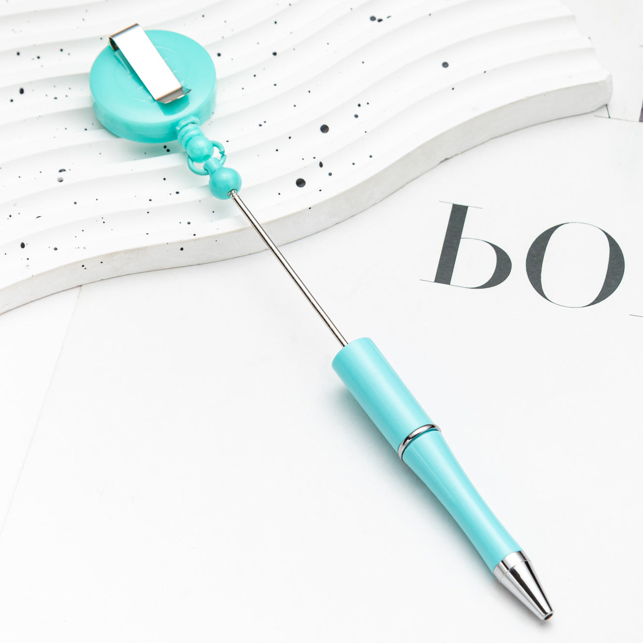 Easy-pull button bead pen