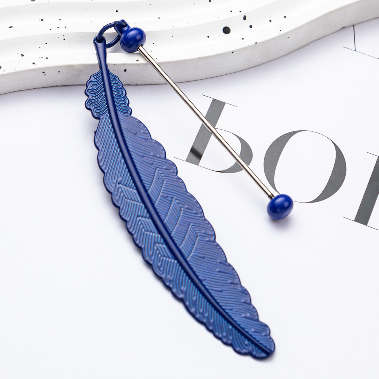 DIY beaded feather bookmark