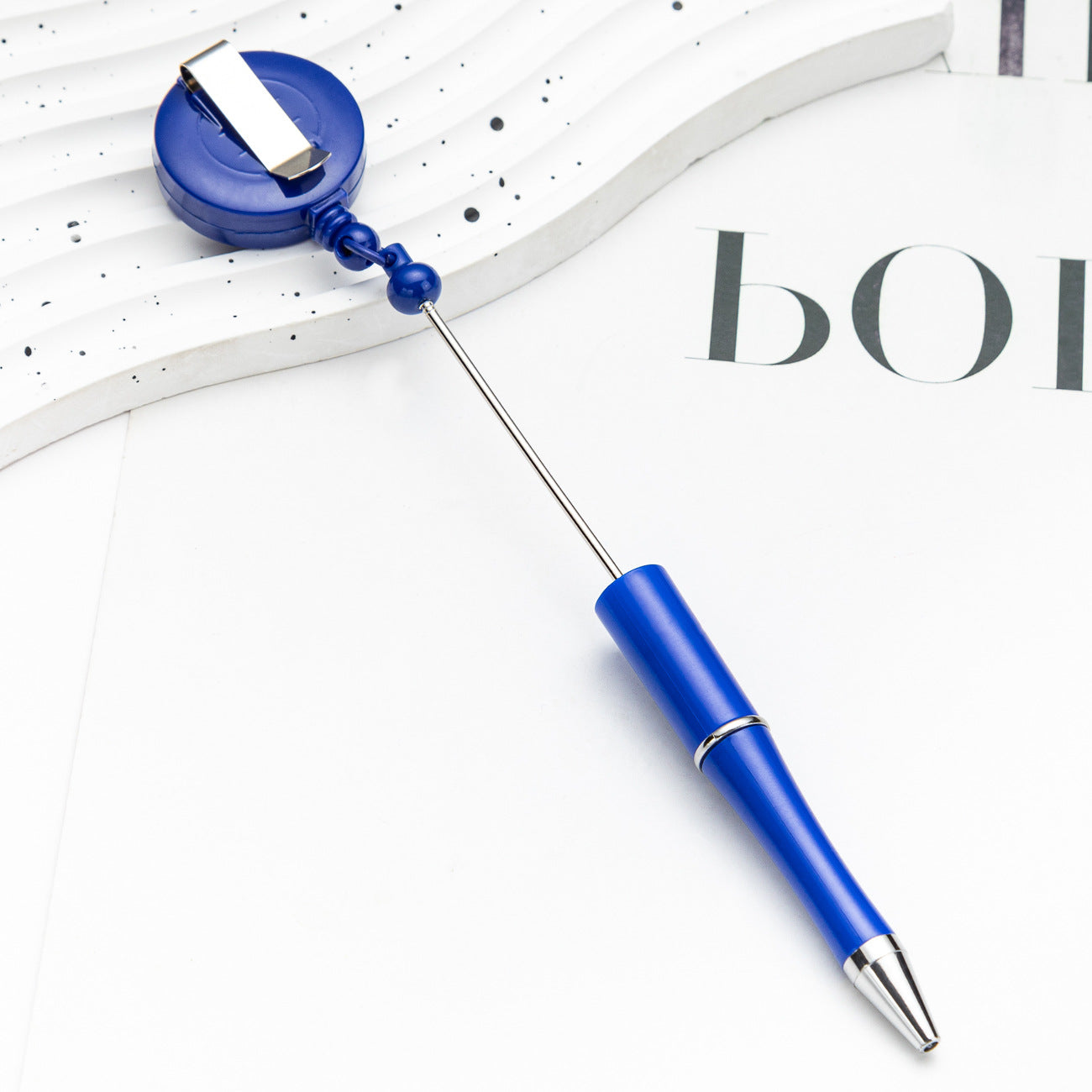 Easy-pull button bead pen