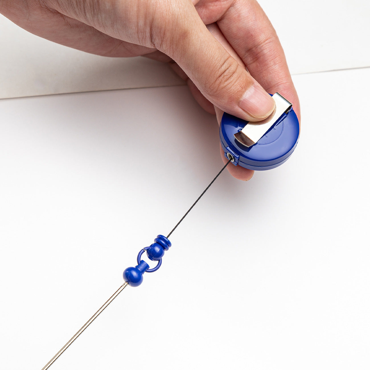 Easy-pull button bead pen