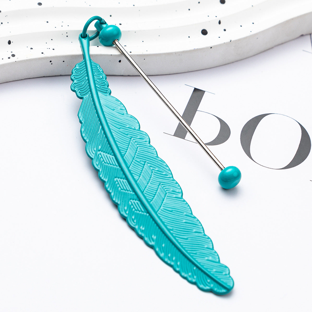 DIY beaded feather bookmark