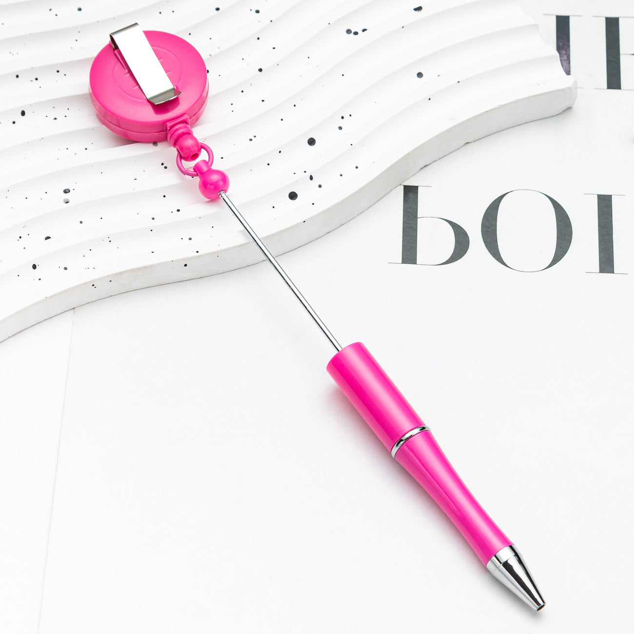 Easy-pull button bead pen