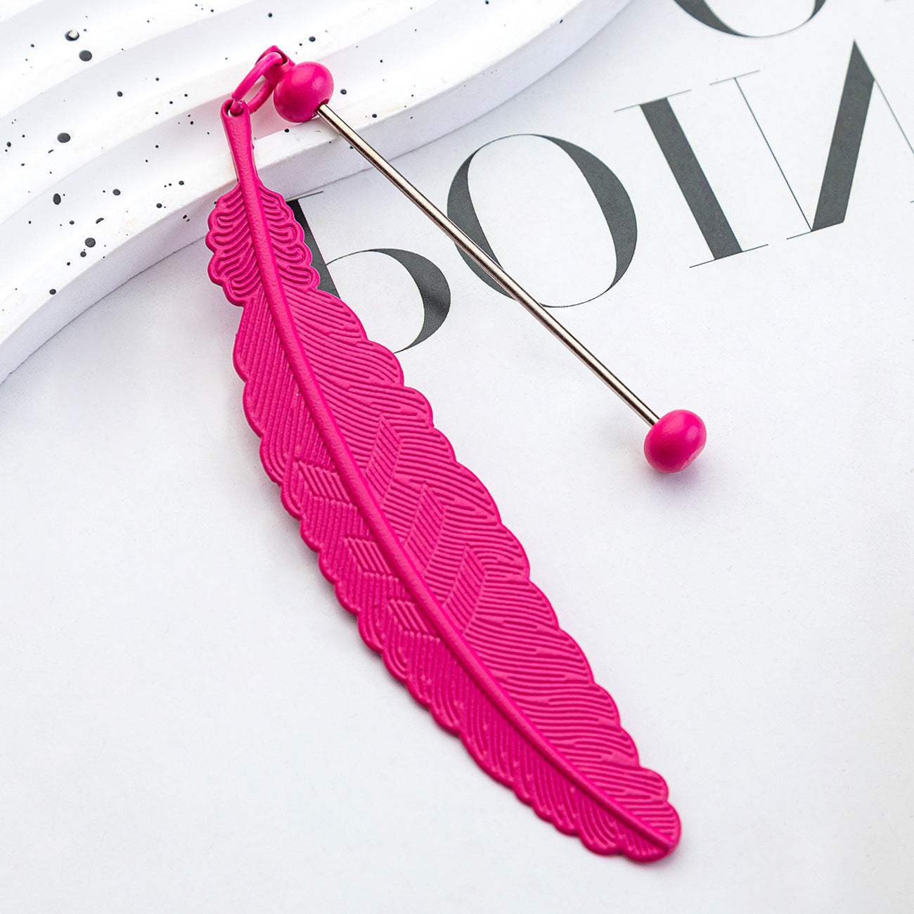 DIY beaded feather bookmark