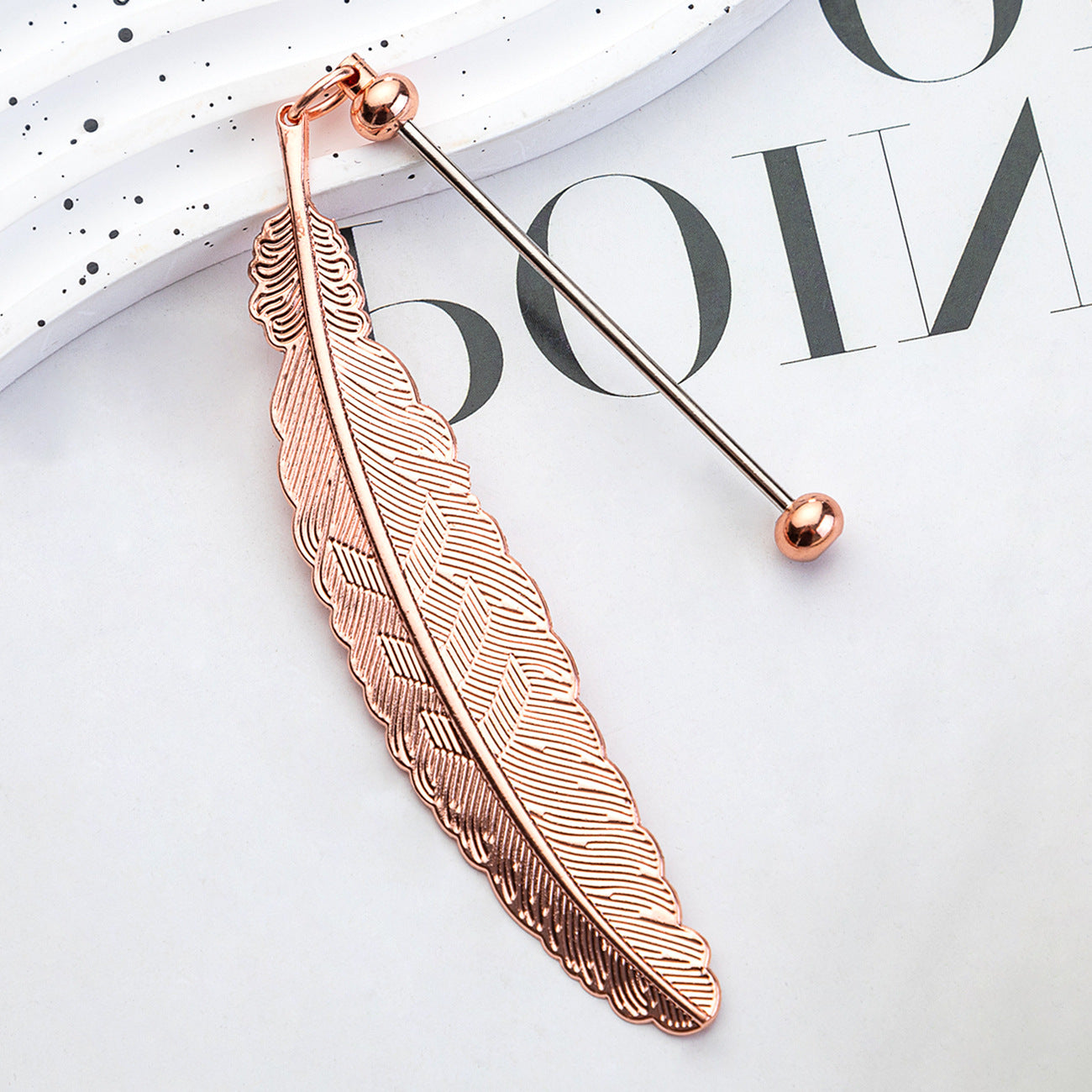 DIY beaded feather bookmark