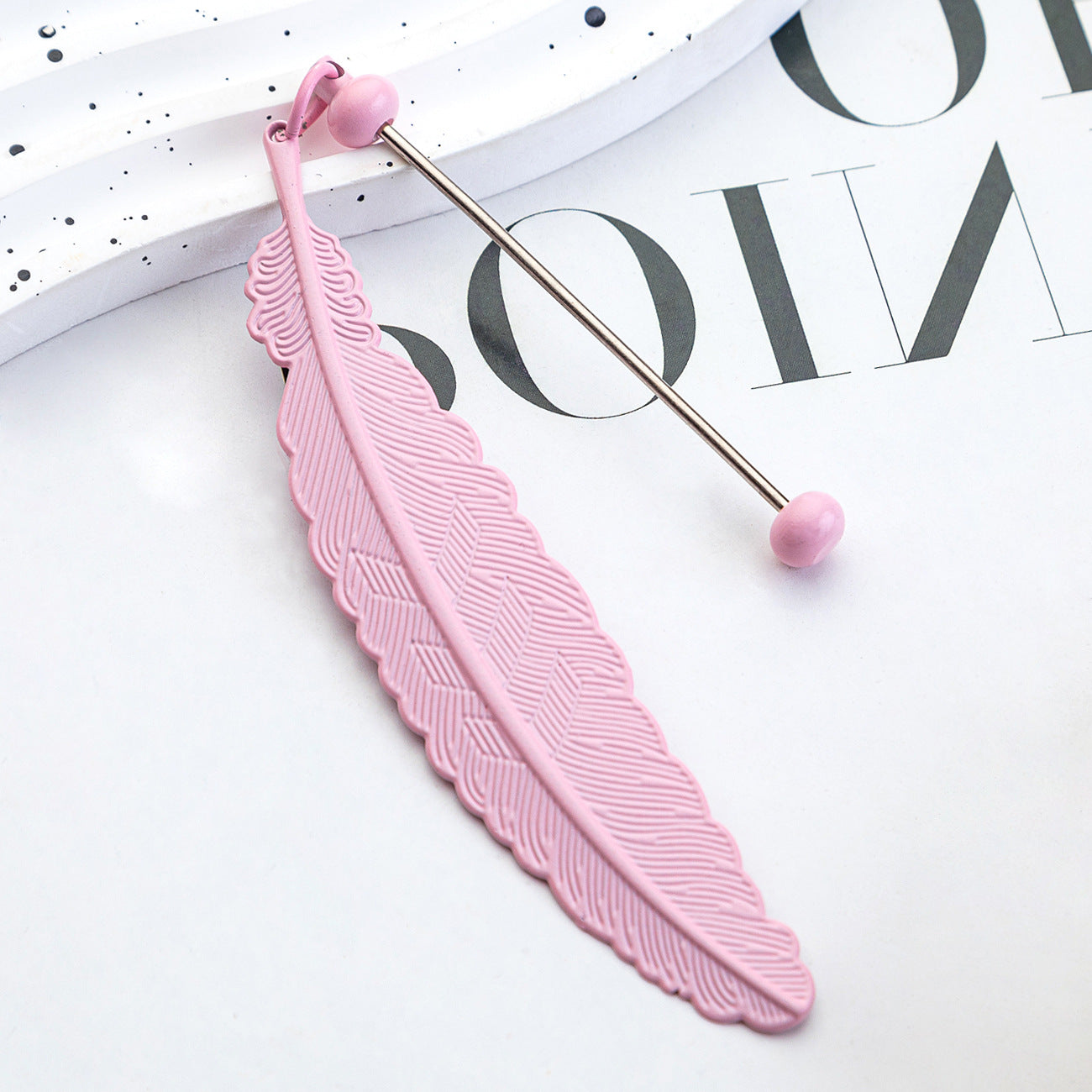 DIY beaded feather bookmark