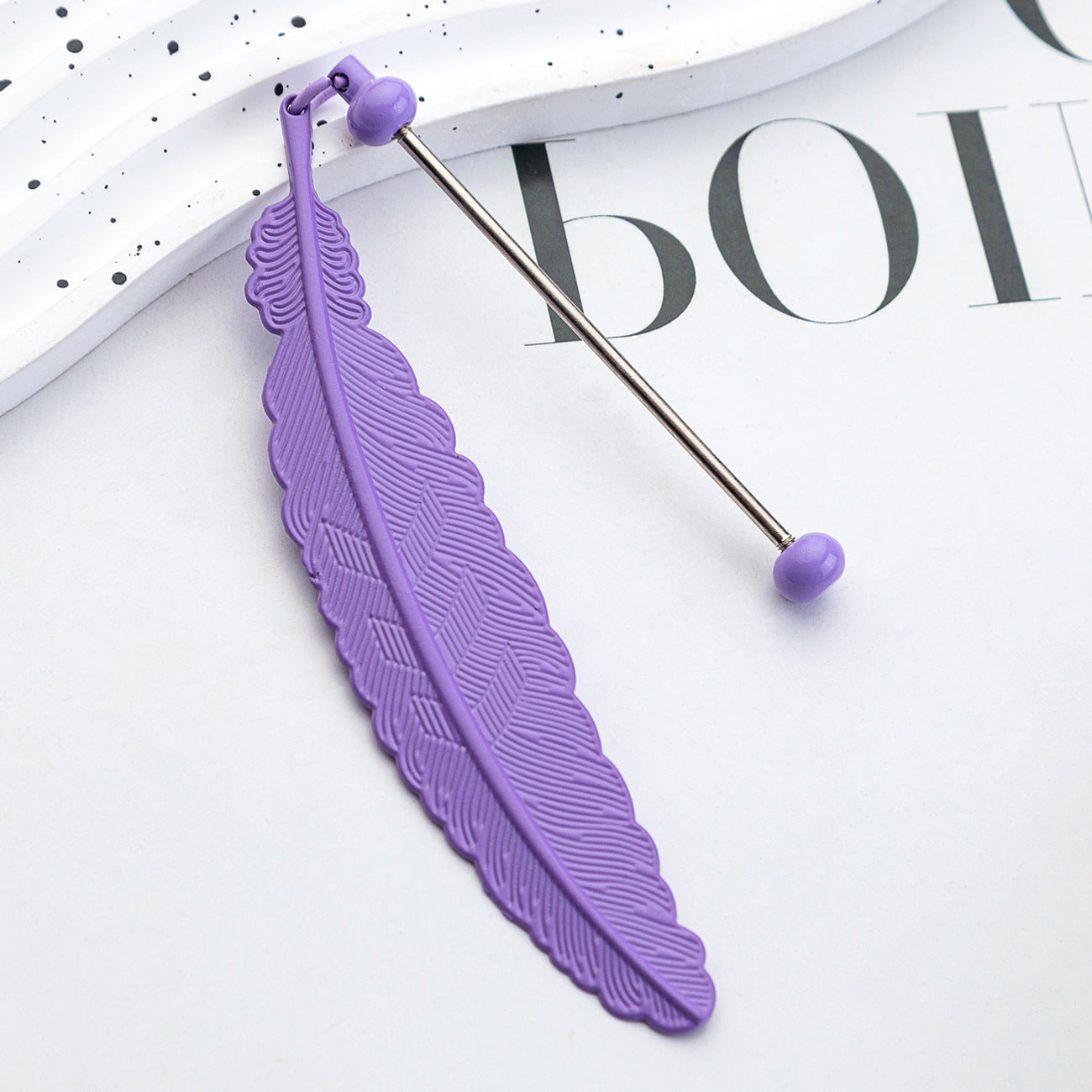 DIY beaded feather bookmark