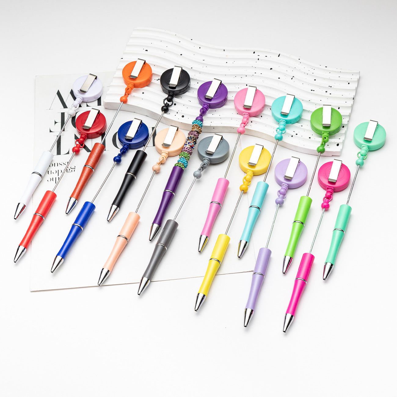 Easy-pull button bead pen