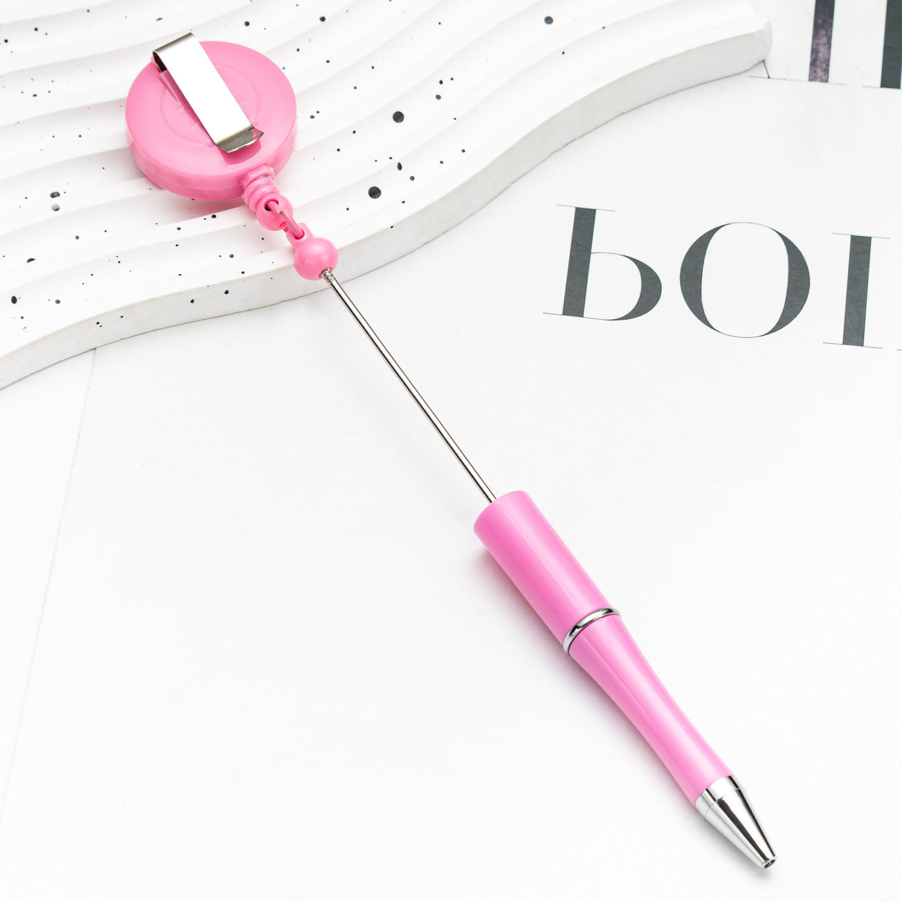 Easy-pull button bead pen